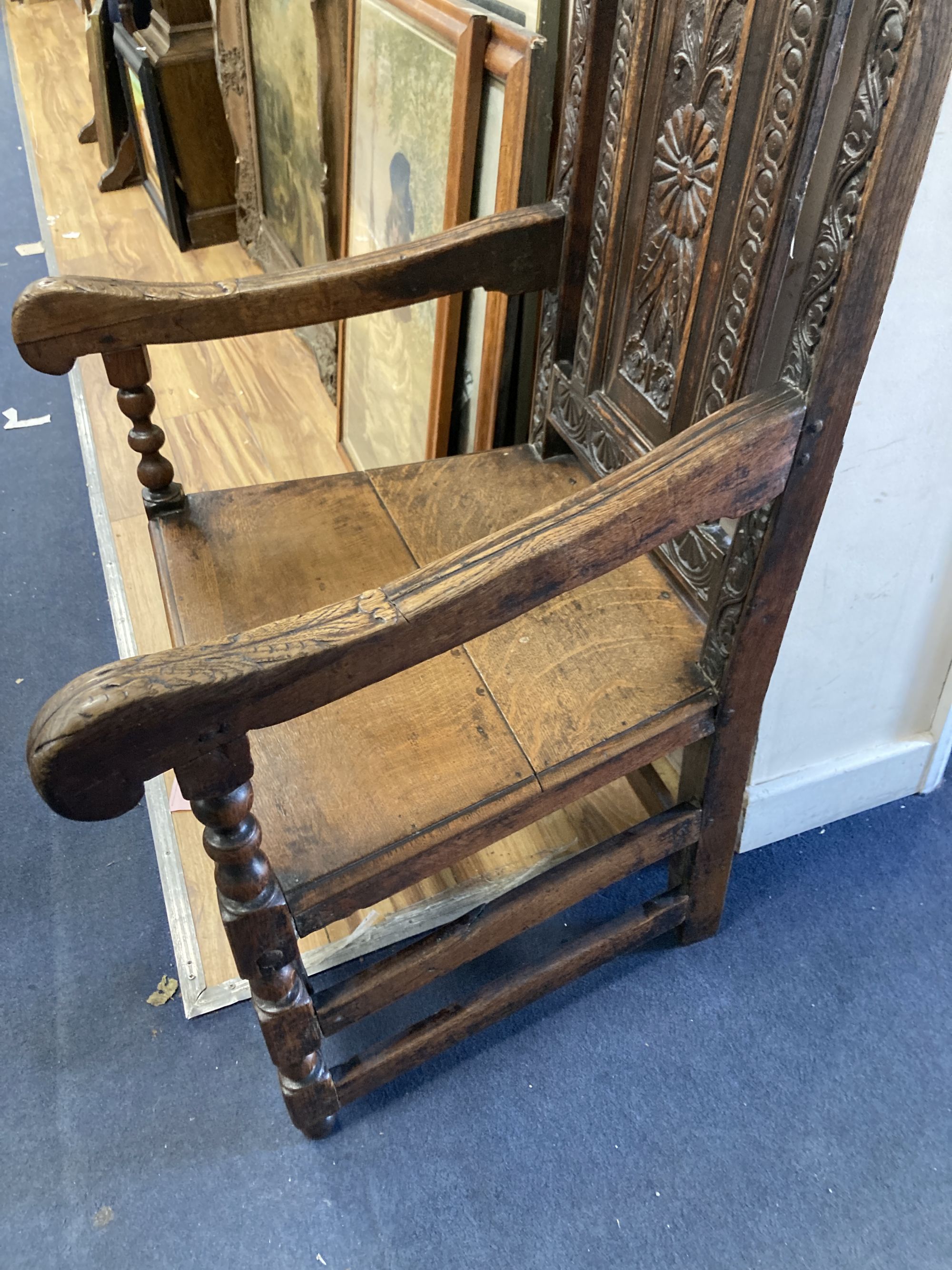 A 19th century oak Wainscot chair, width 64cm depth 49cm height 110cm